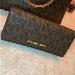 MK monogrammed wallet